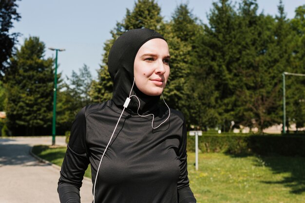 Medium shot of woman with headphones