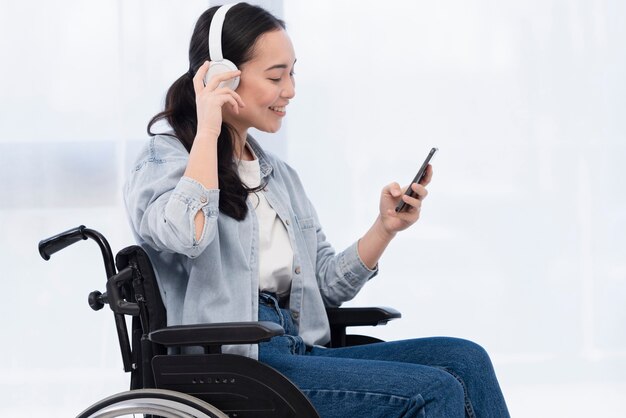 Medium shot woman with headphones