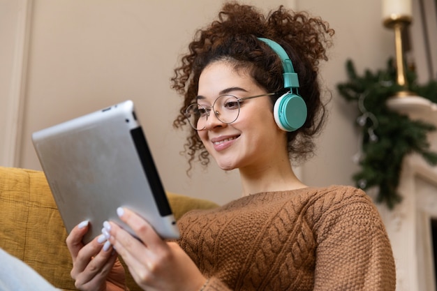 Medium shot woman with headphones