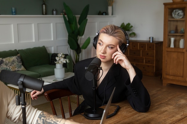 Free photo medium shot woman with headphones