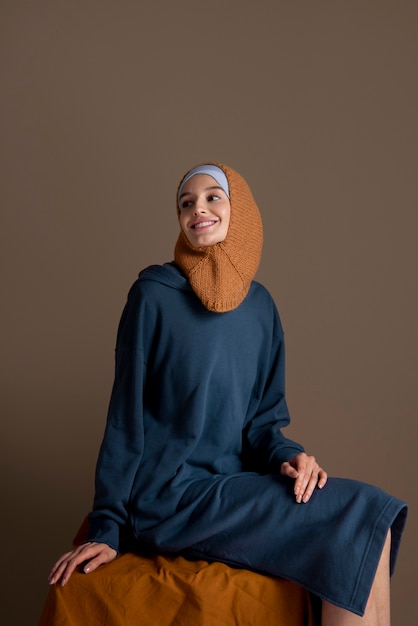 Medium shot woman with hijab portrait