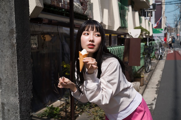 Medium shot woman with ice cream cone