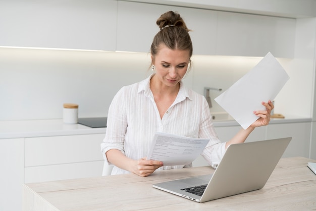 Free photo medium shot woman with papers