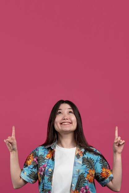 Medium shot woman with pink background