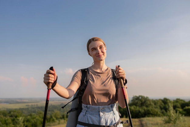 Free photo medium shot woman with sticks