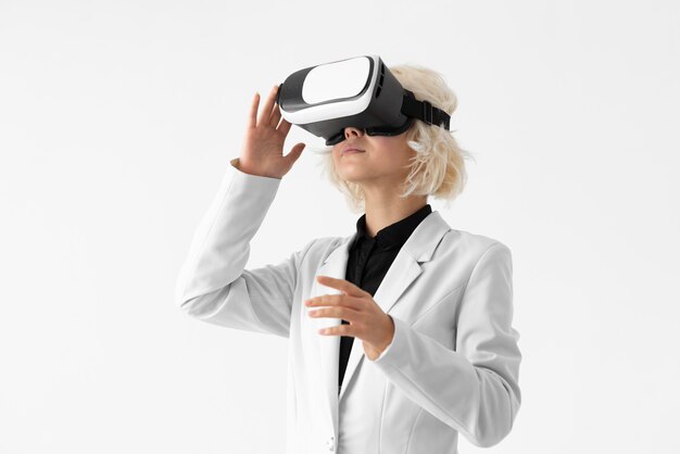 Medium shot woman with vr glasses