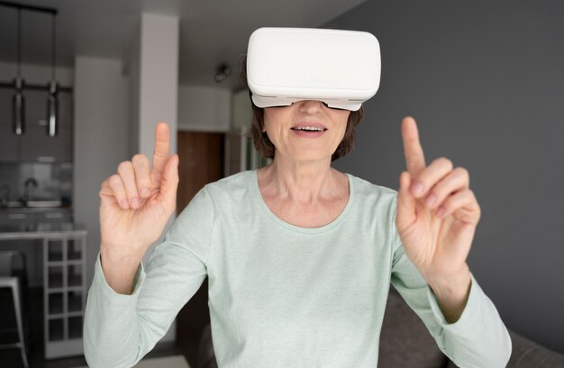 Medium shot woman with vr glasses