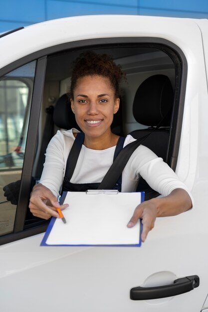 Medium shot woman working as driver