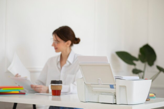 Medium shot woman working at desk