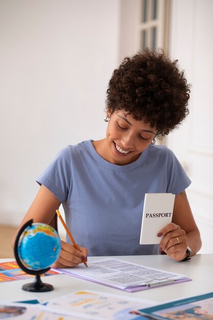 medium shot woman working in  travel agency