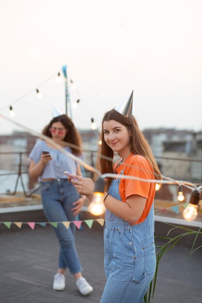 Medium shot women at birthday party