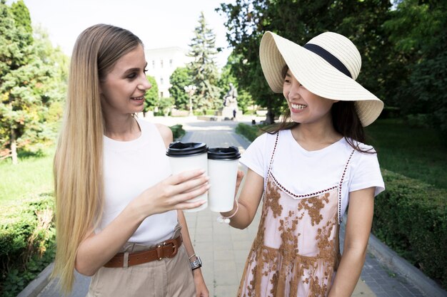 Medium shot women looking at each other