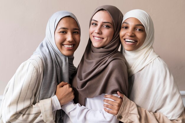 Medium shot women posing together