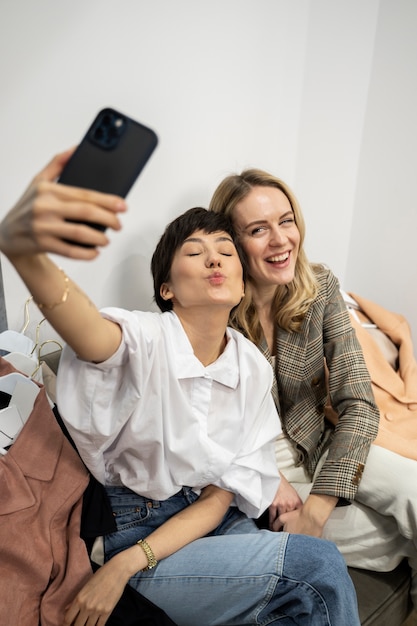 Medium shot women posing together