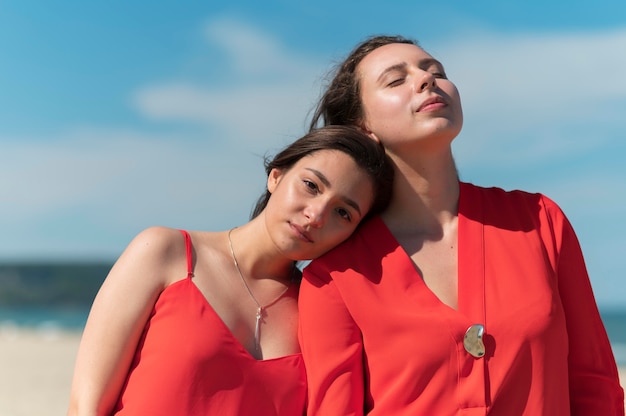 Medium shot women relaxing outdoors