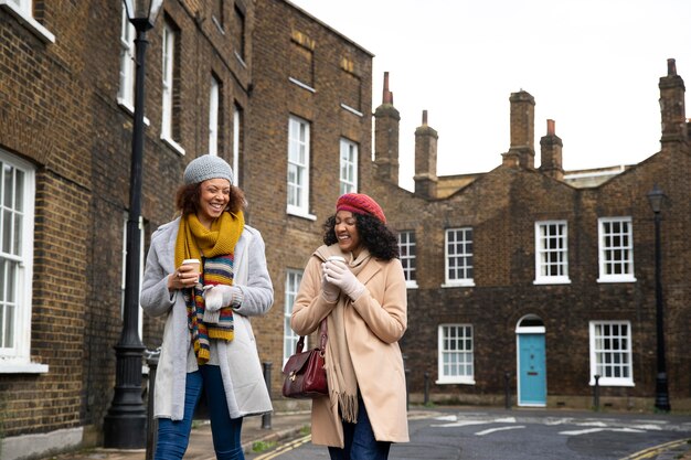 Medium shot women walking together