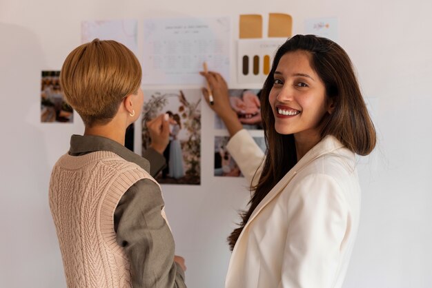 medium shot women working as wedding planners