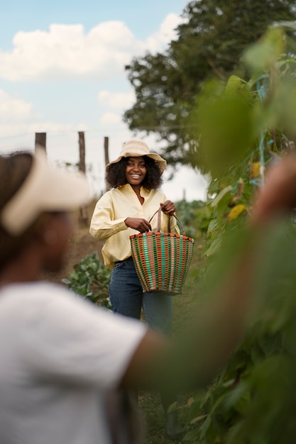 Medium shot women working outdoors