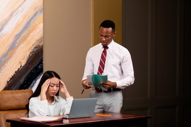 Medium shot worried woman at work