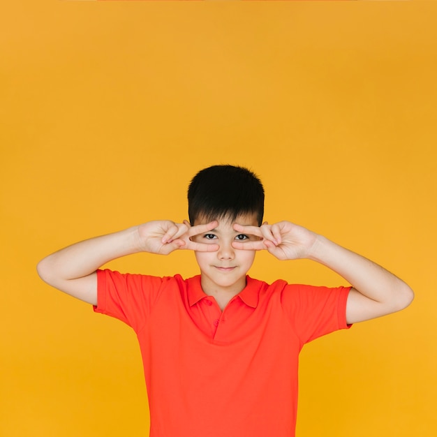 Medium shot young boy smiling