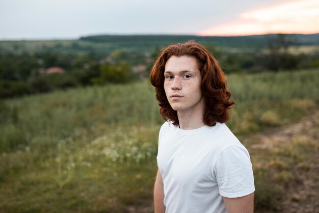 Free photo medium shot young man outdoors