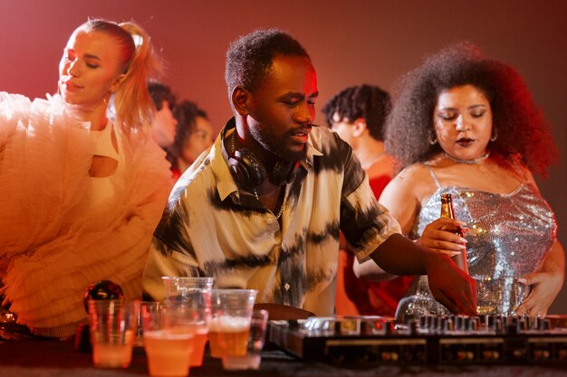 Medium shot young people having fun at party