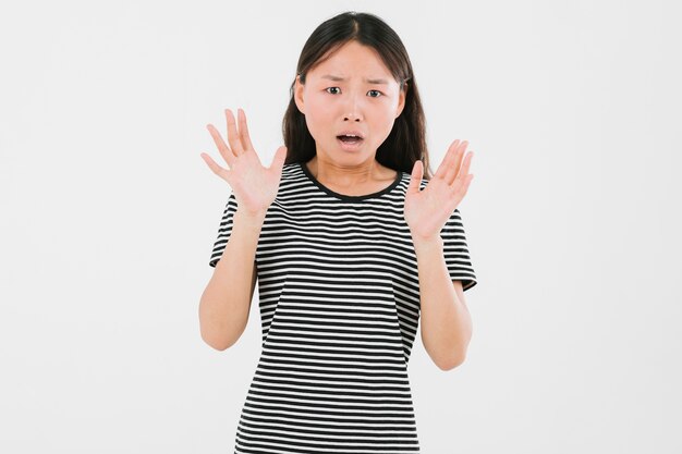 Medium shot young woman looking shocked