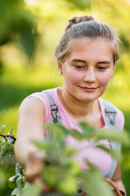 Medium shot young woman outdoors