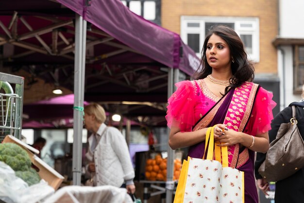 Medium shot young woman shopping