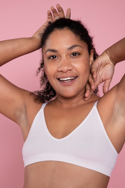 Medium shot young woman studio portrait