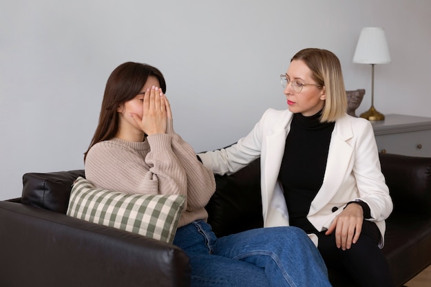 Medium shot young woman undergoing therapy