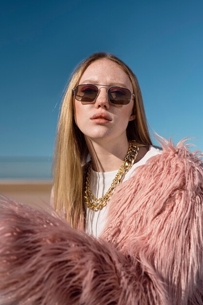 Medium shot young woman with chain necklace