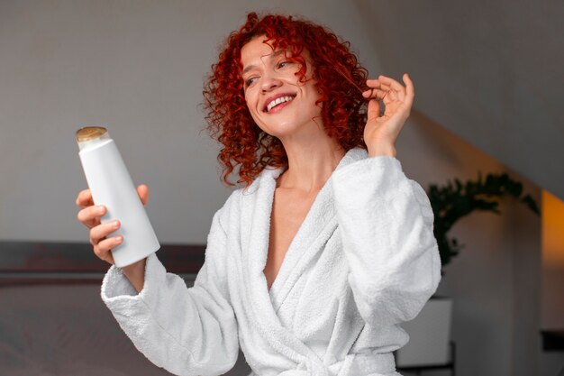 Medium shot young woman with curly hair