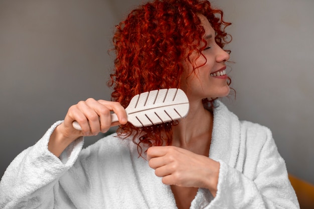 Medium shot young woman with curly hair