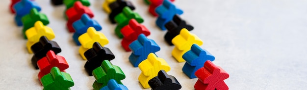 meeple board game pieces aligned