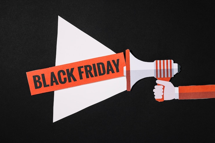 Free Photo megaphone beam with black friday sign