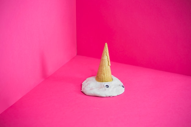 melted-ice-cream-with-cone_23-2147680107.jpg