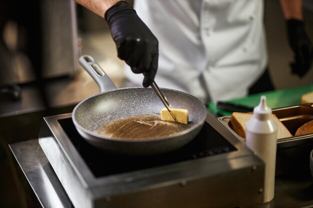 Melting butter for frying in pan