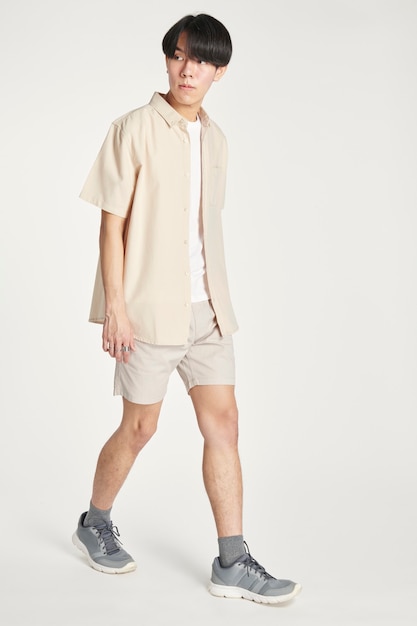 Men in beige shirt minimal outfit