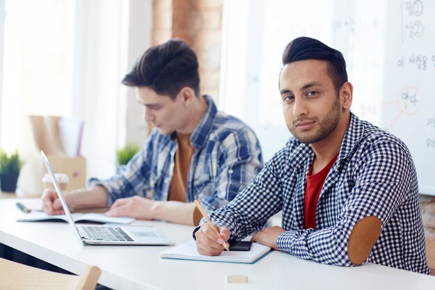 Men by desk