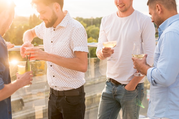 Men discussing at a party