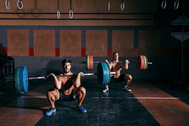 Men doing bodybuilding