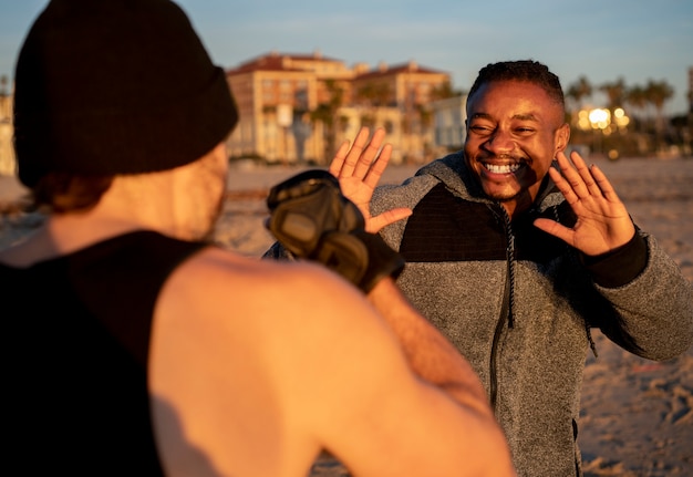 Free photo men getting ready for sport at night