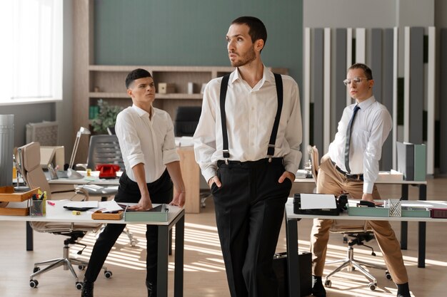 Men performing vogue dance indoors