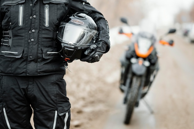 Men riding motorcycle on winter day