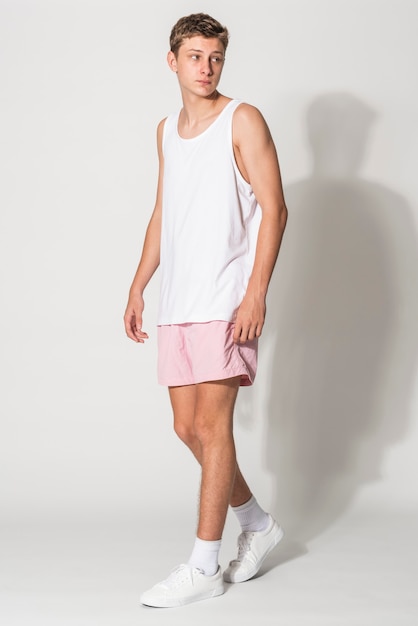 Men's white tank top and pink shorts