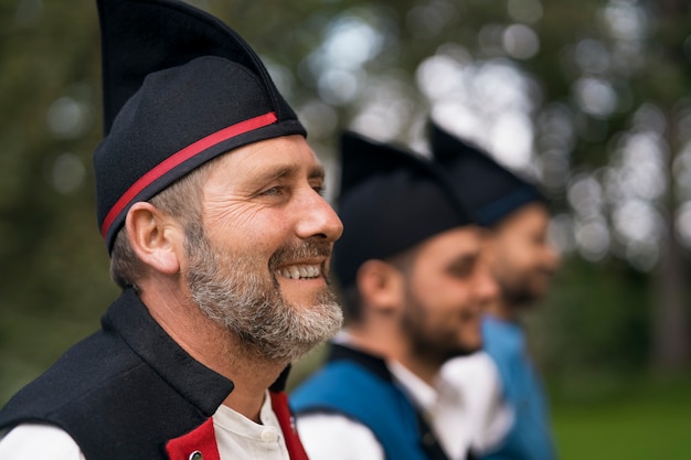 Free photo men in traditional clothes mediums shot