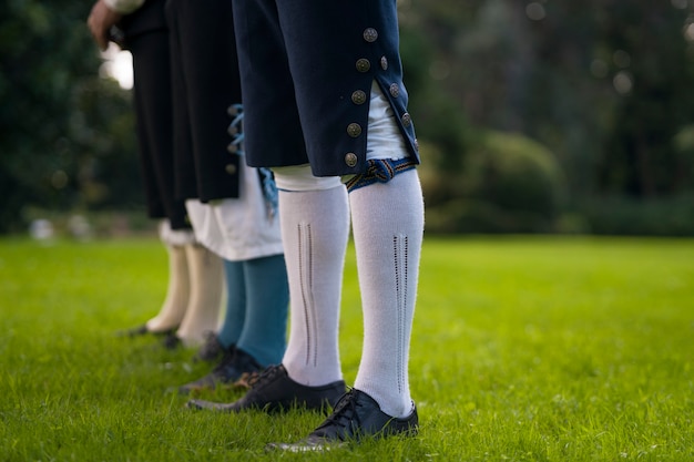 Men in traditional clothes side view