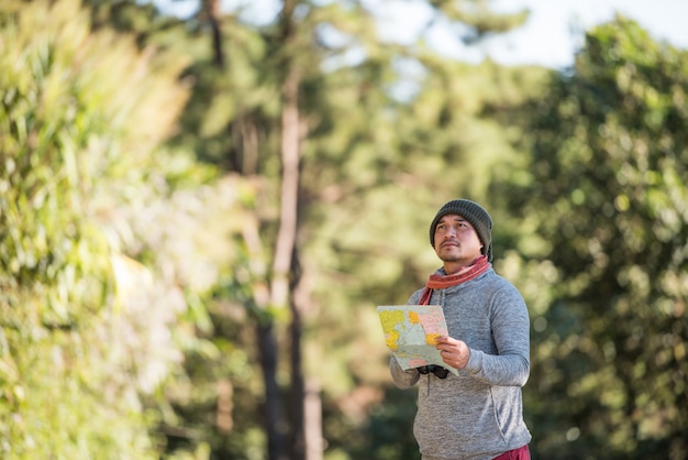 Men traveller going alone in the wild