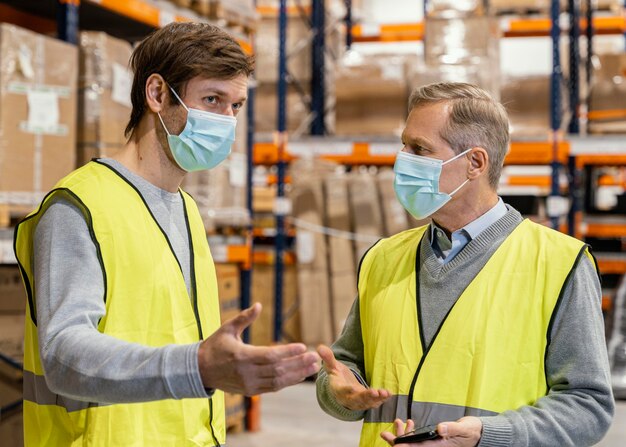 Men in warehouse working